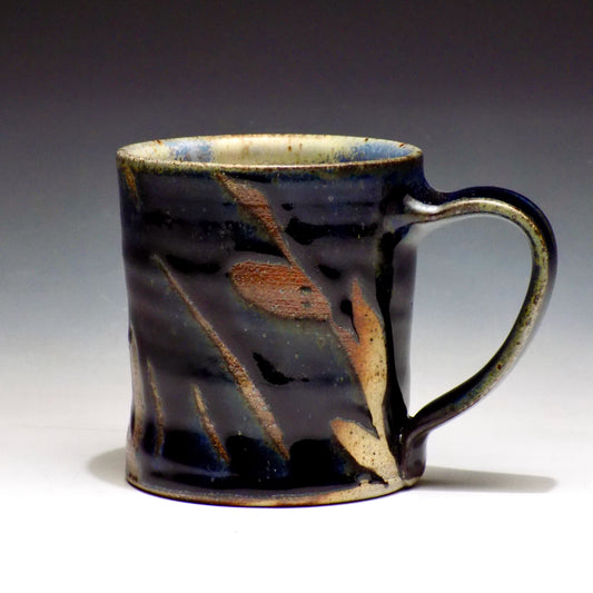 Handmade wood-fired dark blue mug by Liza Fisher in Maine